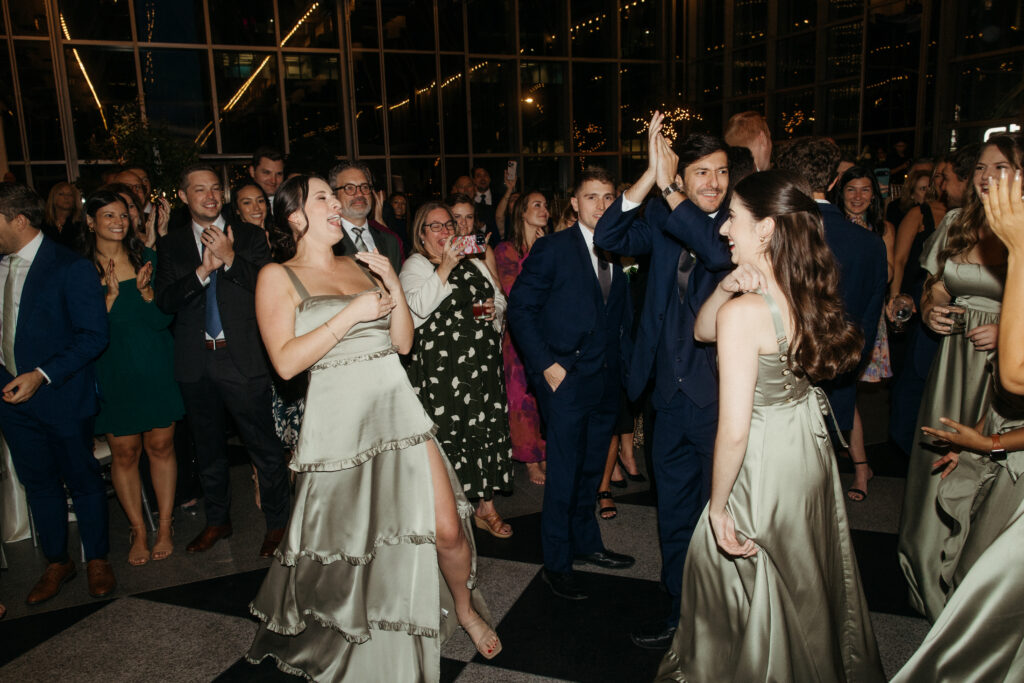 wedding reception inside PPG Wintergarden with natural light
