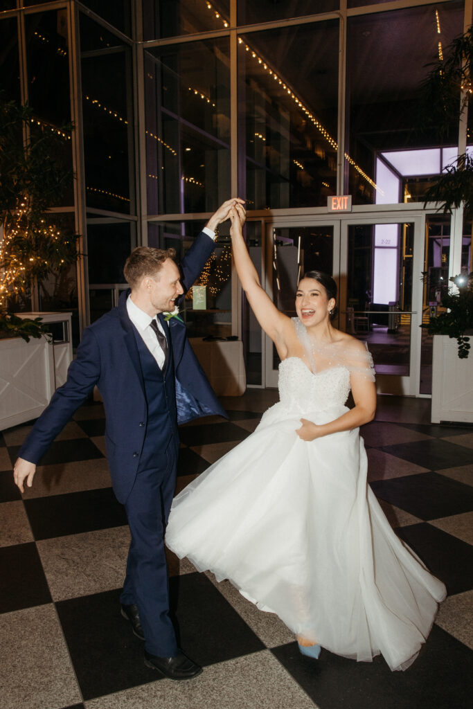 wedding reception inside PPG Wintergarden with natural light