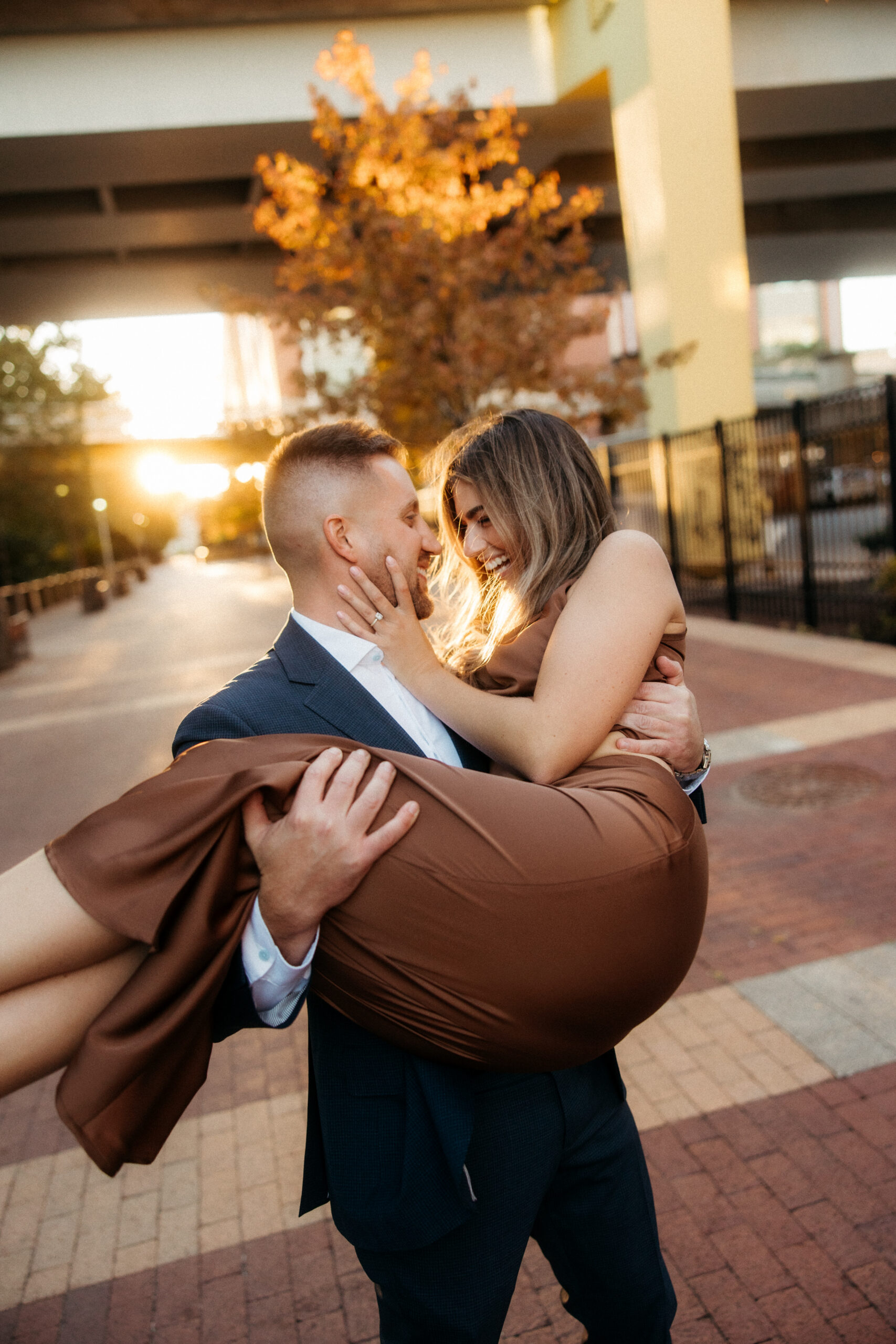 Romantic portraits with Pittsburgh skyline during North Shore engagement photos