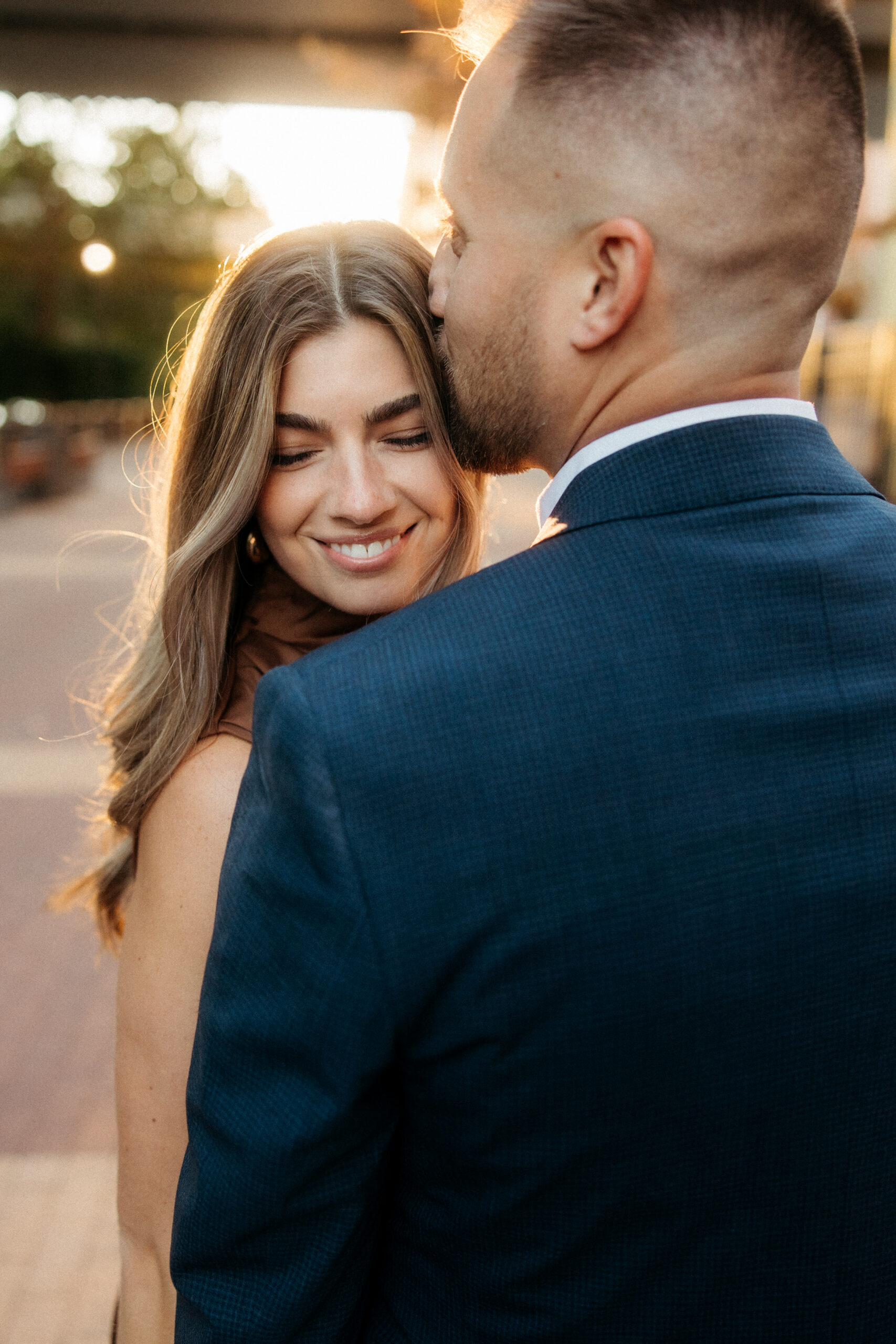 Romantic portraits with Pittsburgh skyline during North Shore engagement photos