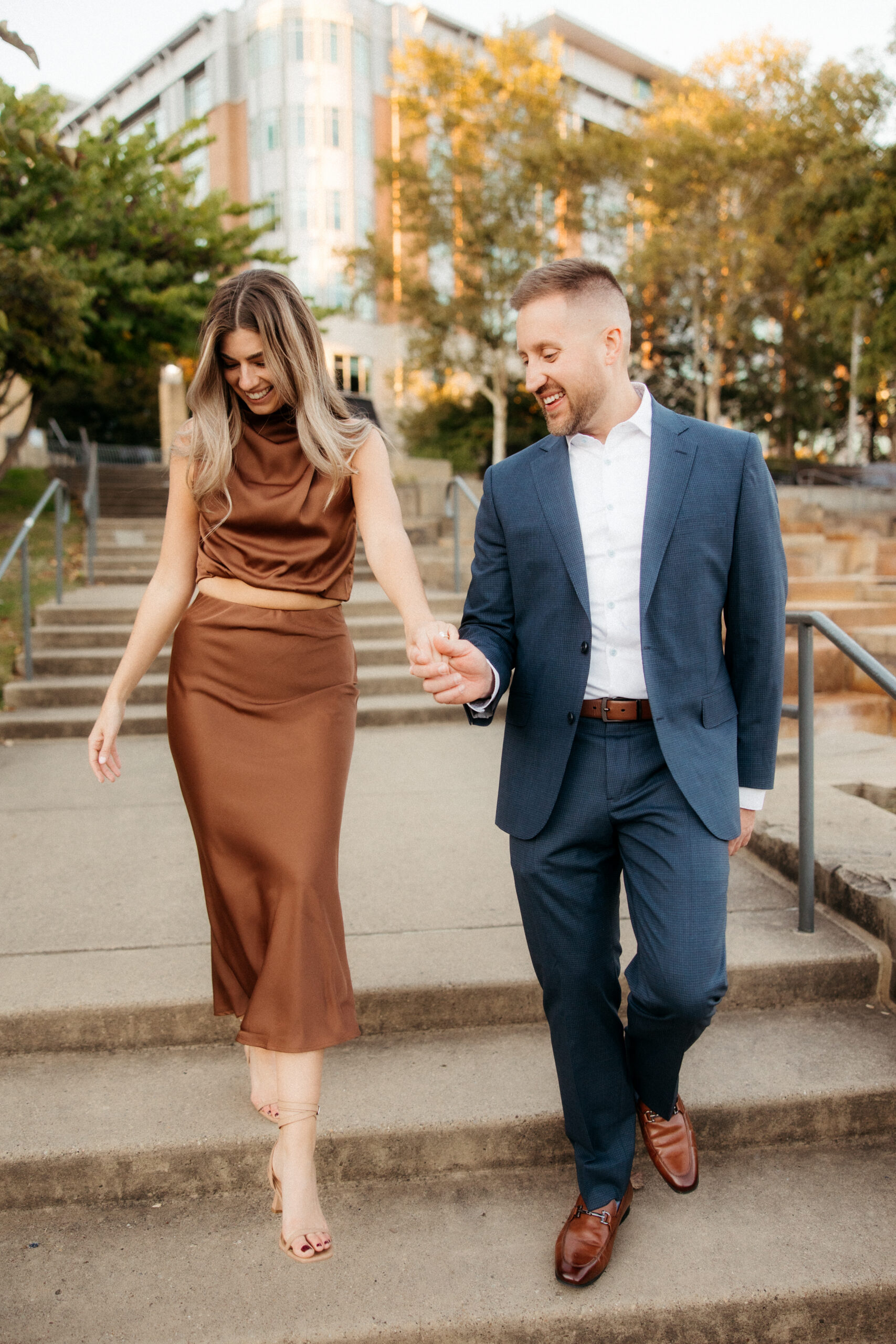 Romantic portraits with Pittsburgh skyline during North Shore engagement photos