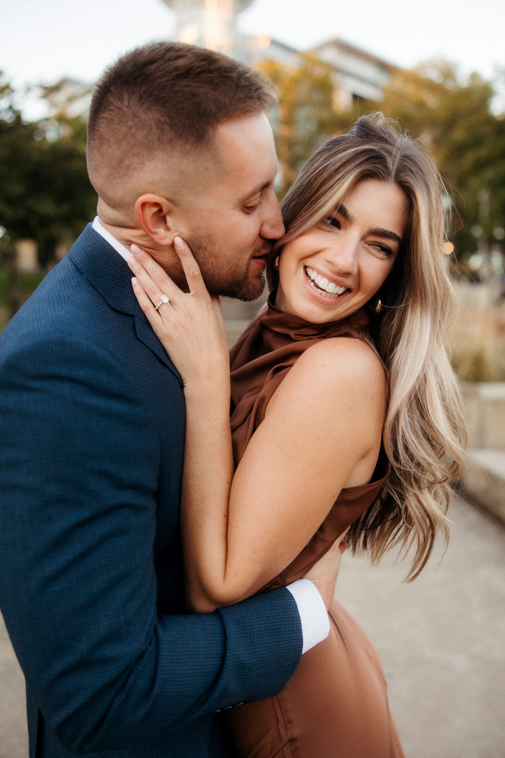 Romantic portraits with Pittsburgh skyline during North Shore engagement photos