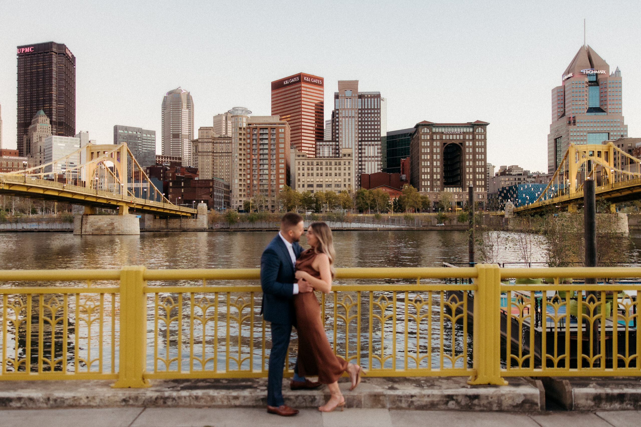 Romantic portraits with Pittsburgh skyline during North Shore engagement photos