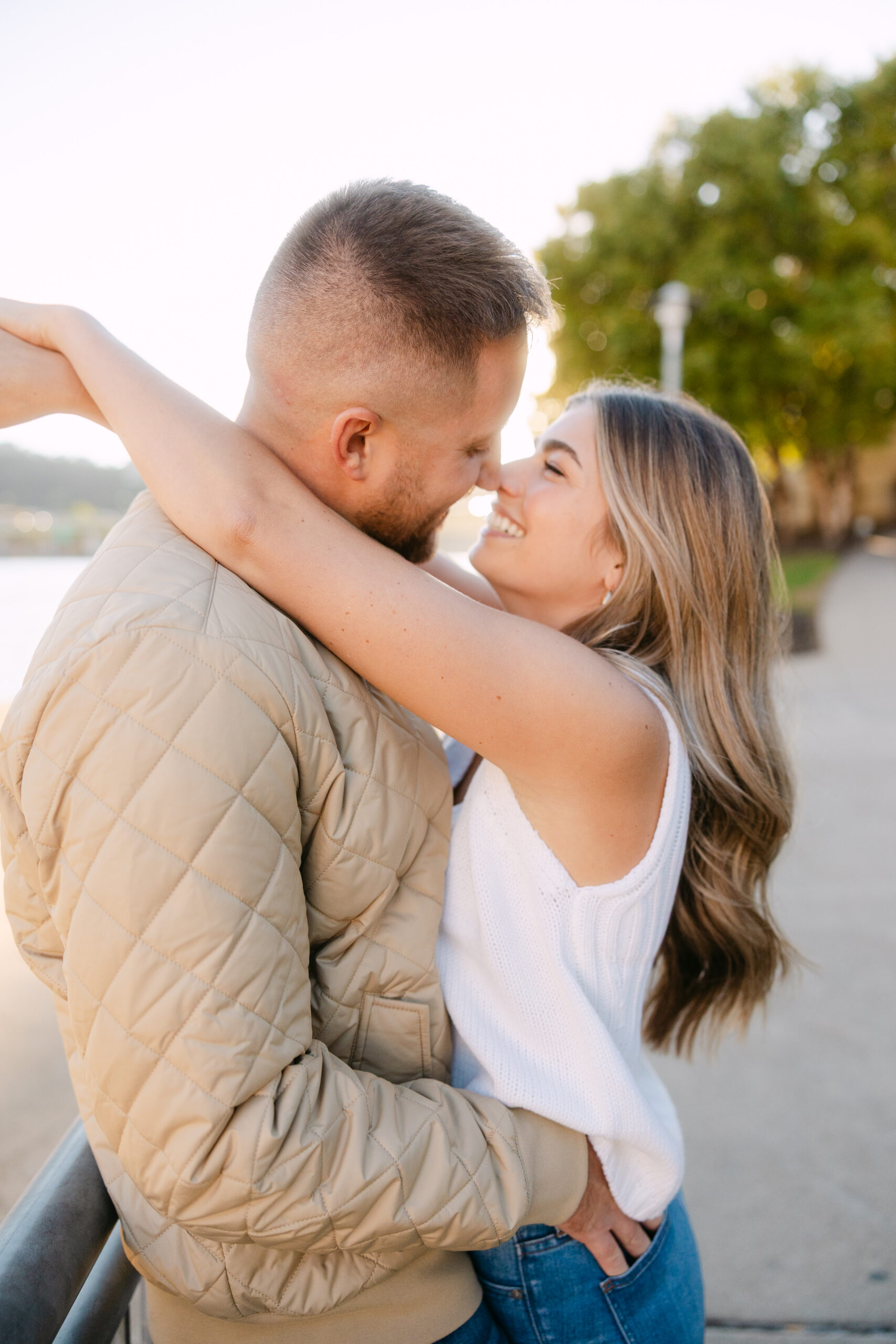 Romantic portraits with Pittsburgh skyline during North Shore engagement photos