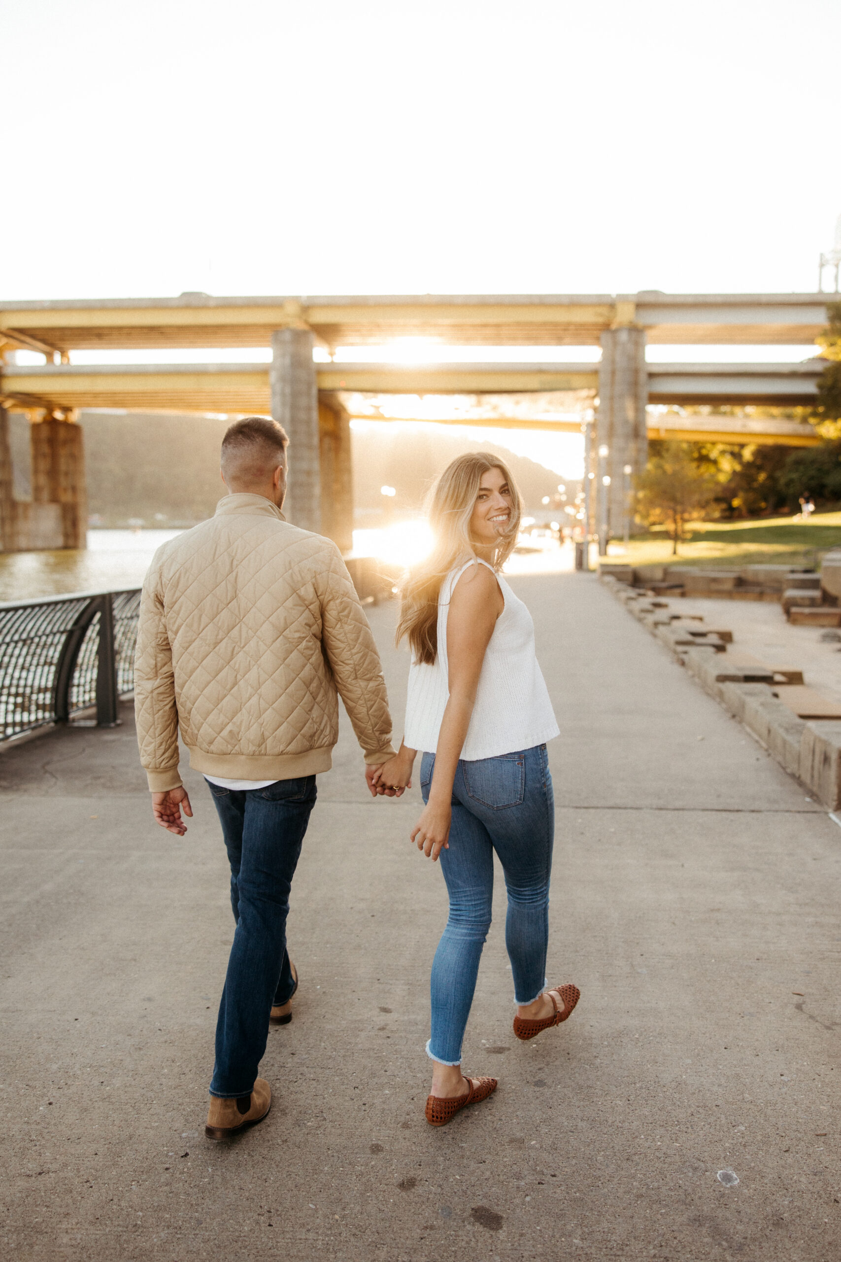 Romantic portraits with Pittsburgh skyline during North Shore engagement photos
